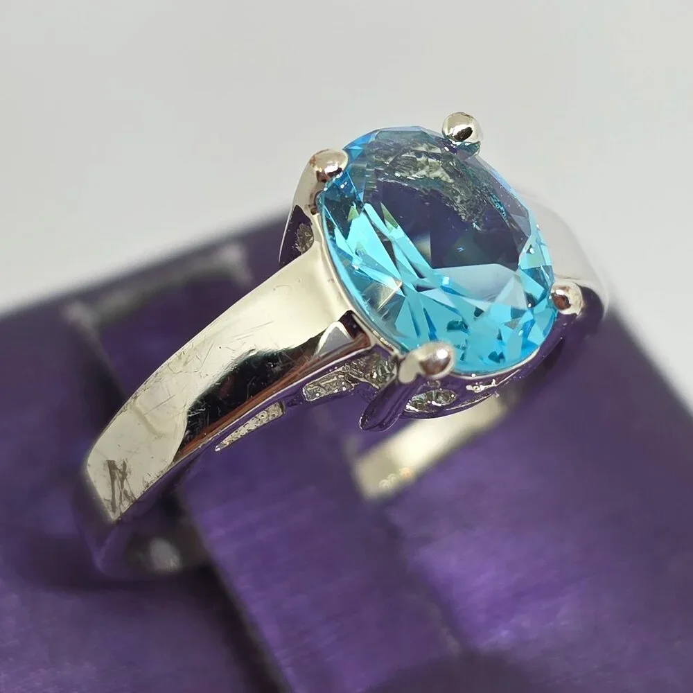 Beautiful Silver Oval Faceted Light Blue Rhodium Plated Solitaire Ring Sz 6.75